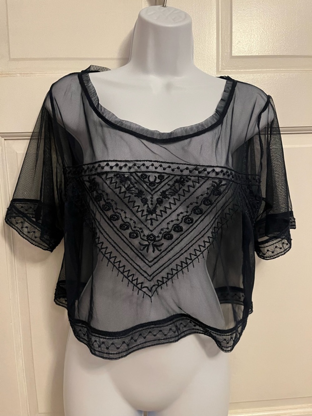 Navy Blue Sheer Embroidered Short-Sleeve Blouse. Wear over a tank or blouse.